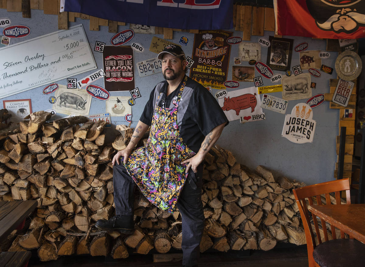 Steve Overlay, owner of Sin City Smokers Barbecue and Catering, poses for a photo at his Hender ...