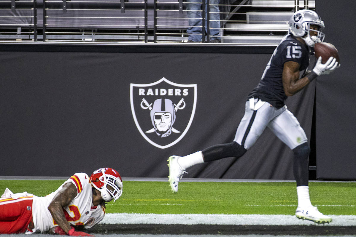 Las Vegas Raiders wide receiver Nelson Agholor (15) secures a touchdown catch as Kansas City Ch ...