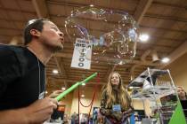 Shooki Grasiani from Fort Lauderdale, Fla. shows off the bubbles at the South Beach Bubbles boo ...