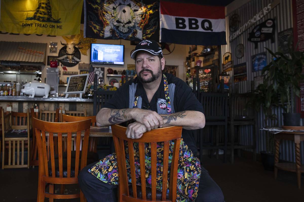 Steve Overlay, owner of Sin City Smokers Barbecue and Catering, poses for a photo at his Hender ...