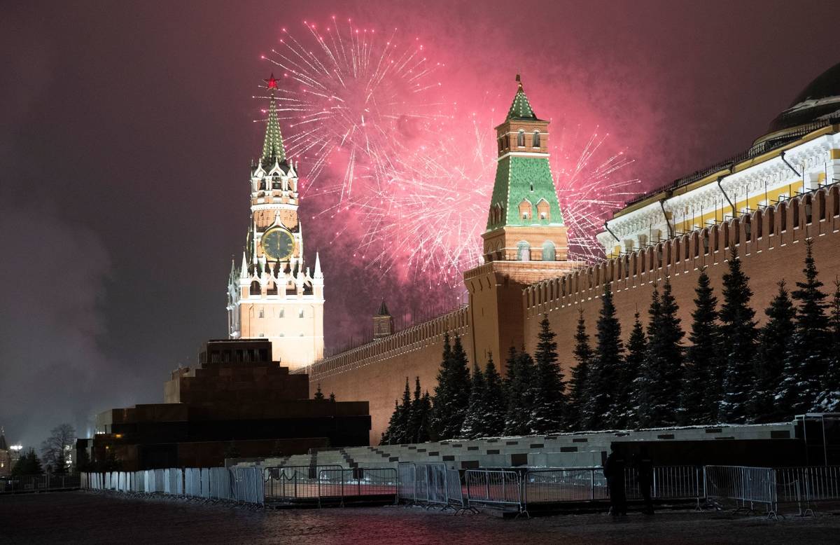 Fireworks explode over the Kremlin and almost empty Red Square during New Year's celebrations n ...