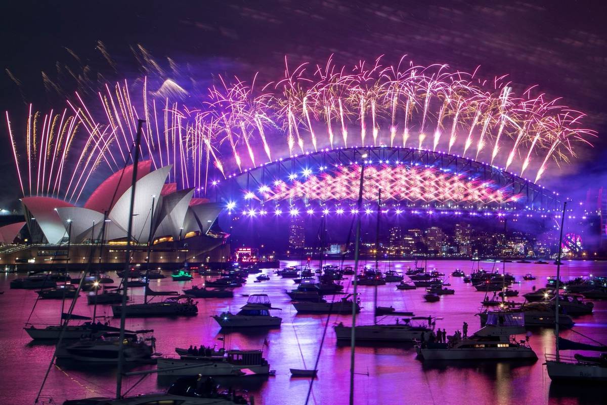 Fireworks explode over the Sydney Opera House and Harbour Bridge as New Year celebrations begin ...