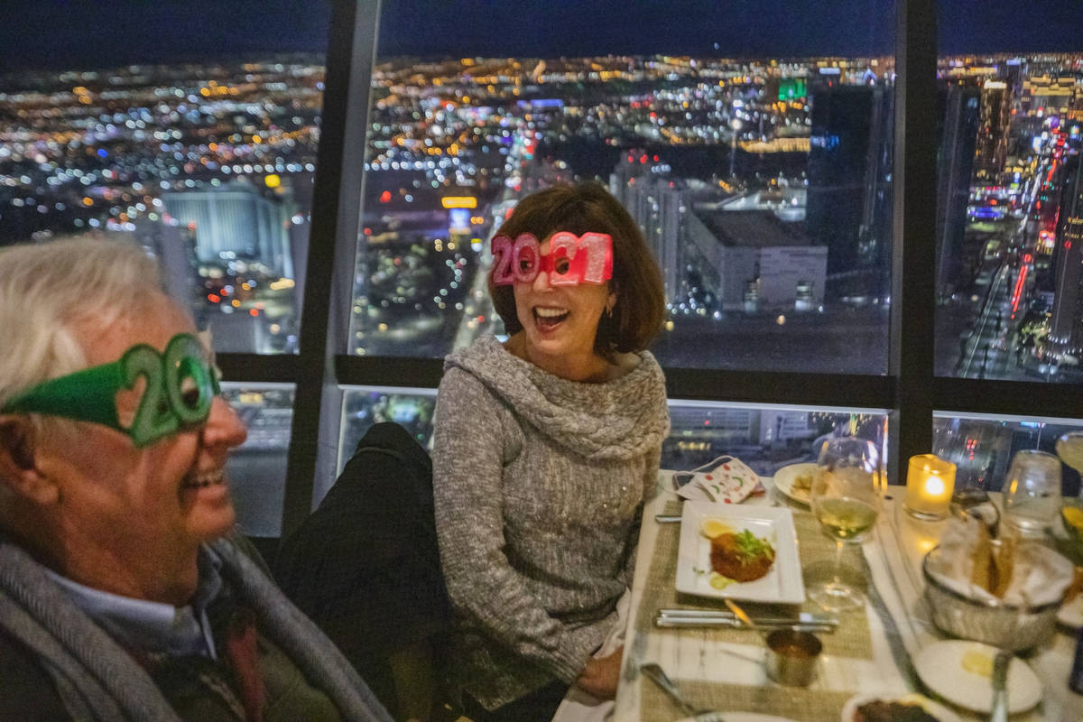 Joe Davis, left, and Linda Davis dine at the Top of the World at the Strat, on Thursday, Dec. 3 ...