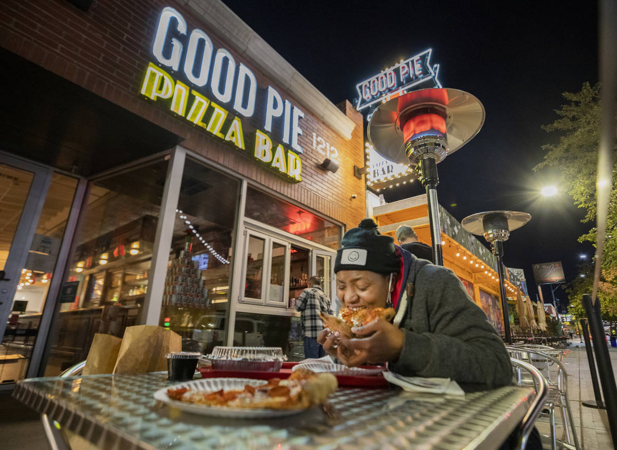 Kim Winkfield, 36, of North Las Vegas, eats at Good Pie in downtown Las Vegas on Thursday, Dec. ...