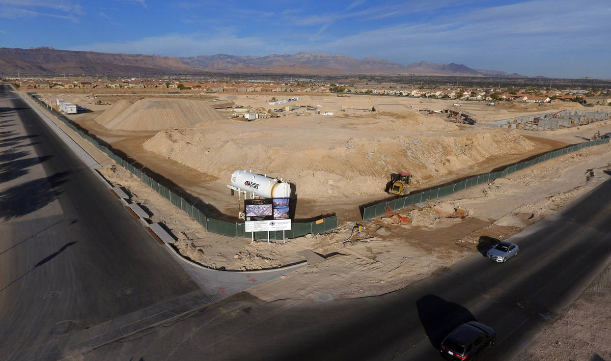 The Evora apartment complex site where a huge mixed-use complex is under construction is photog ...