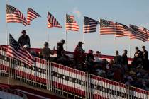 FILE - In this Dec. 5, 2020, file photo crowds wait for the start of a rally featuring Presiden ...