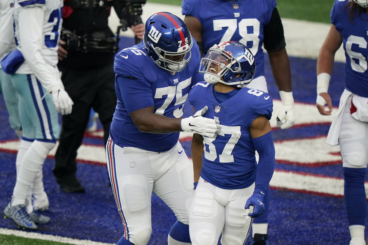 New York Giants' Sterling Shepard (87) celebrates his touchdown during the first half of an NFL ...