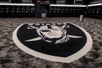 The locker room for the Las Vegas Raiders features a large logo and plenty of room to move for ...