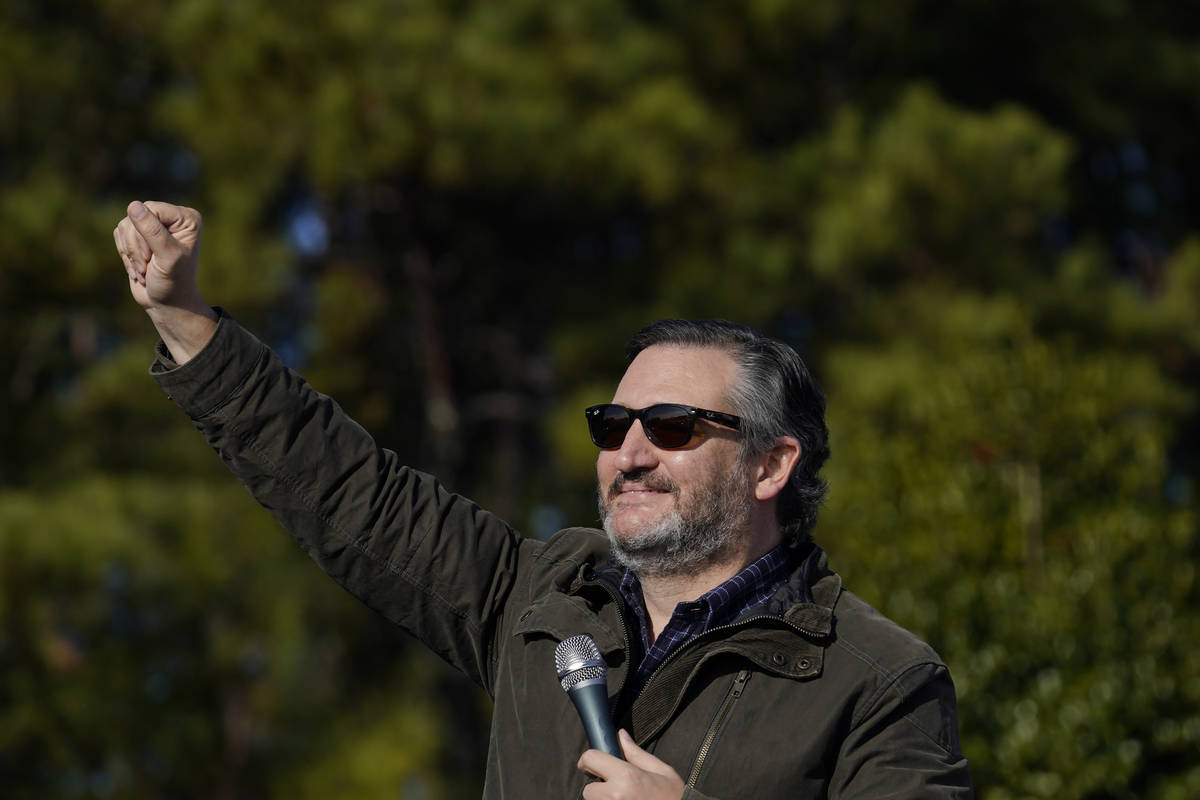 Sen. Ted Cruz, R-Texas, greets a crowd before he speaks at a campaign rally for Sen. Kelly Loef ...