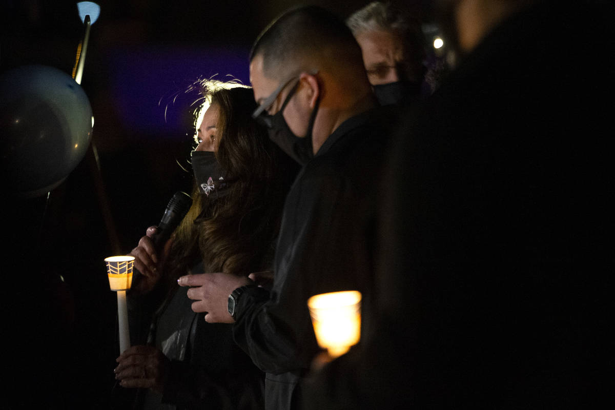Evelina Sulrzycki, sister-in-law to Eric Echevarria, speaks at a vigil for him on Sunday, Jan. ...