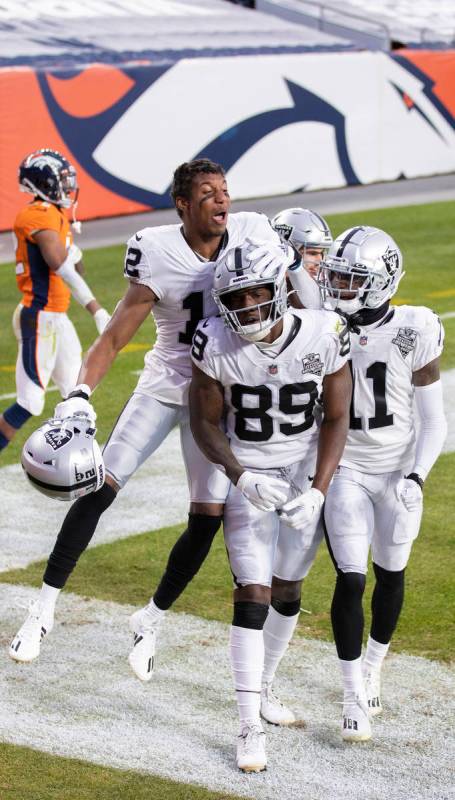 Raiders wide receiver Bryan Edwards (89) celebrates after scoring a touchdown in the second qua ...