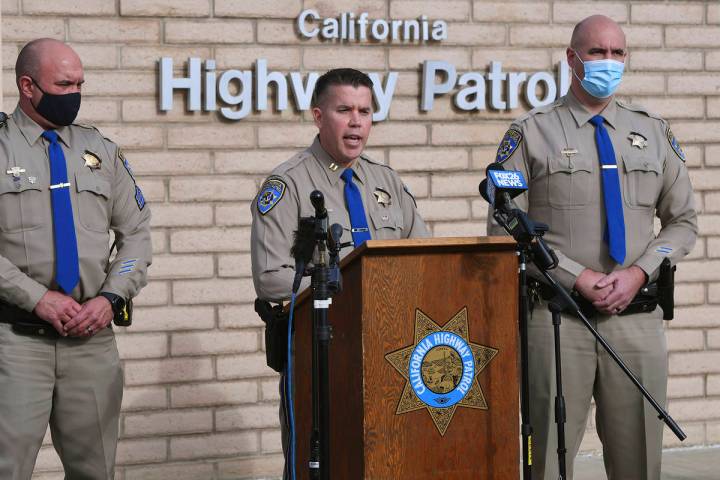 California Highway Patrol Captain Kevin Clays, center, updates the media about Friday's fatal c ...