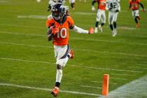 Denver Broncos wide receiver Jerry Jeudy (10) scores a 92-yard touchdown against the Las Vegas ...