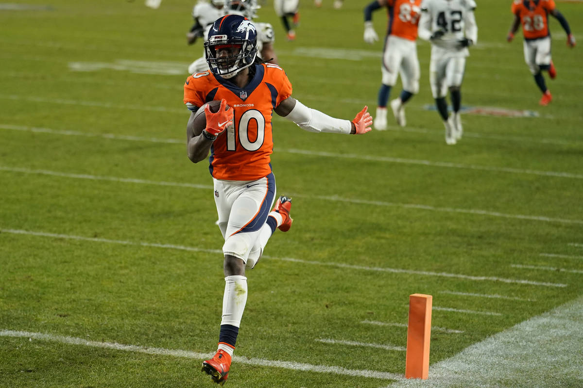 Denver Broncos wide receiver Jerry Jeudy (10) scores a 92-yard touchdown against the Las Vegas ...