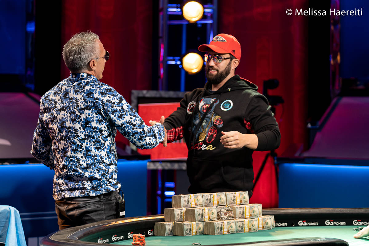 Damian Salas, left, and Joseph Hebert embrace after Salas won the World Series of Poker Main Ev ...