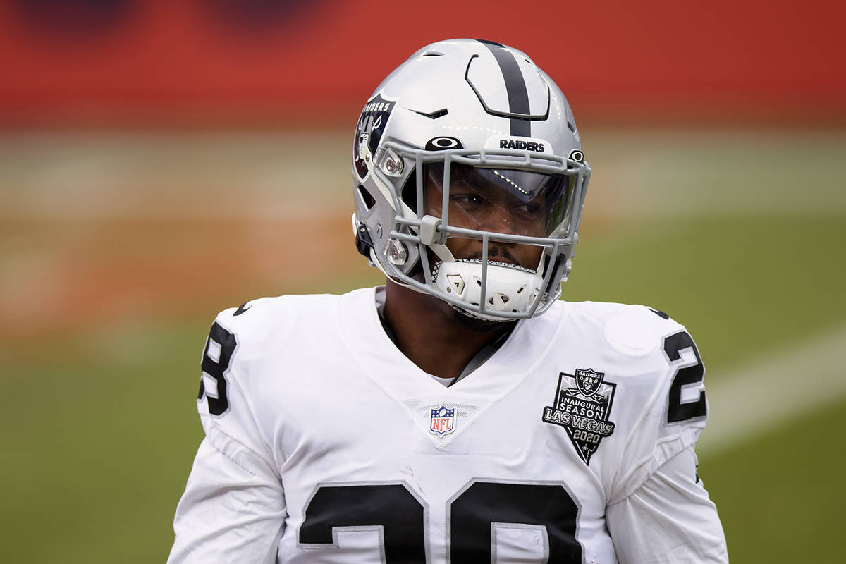 Las Vegas Raiders running back Josh Jacobs (28) stands on the field against the Denver Broncos ...
