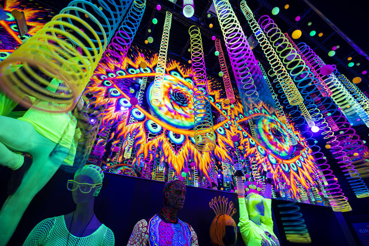 Artwork and slinkies are seen in the gift shop during a tour of Wink World at Area15 in Las Veg ...