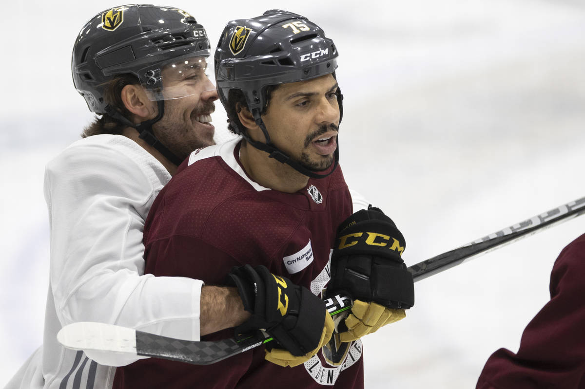 Golden Knights forward Chandler Stephenson (20) jokes around with Golden Knights forward Ryan R ...