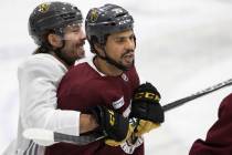 Golden Knights forward Chandler Stephenson (20) jokes around with Golden Knights forward Ryan R ...