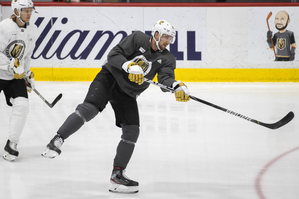 Golden Knights defenseman Shea Theodore (27) shoots on goal during practice at City National Ar ...