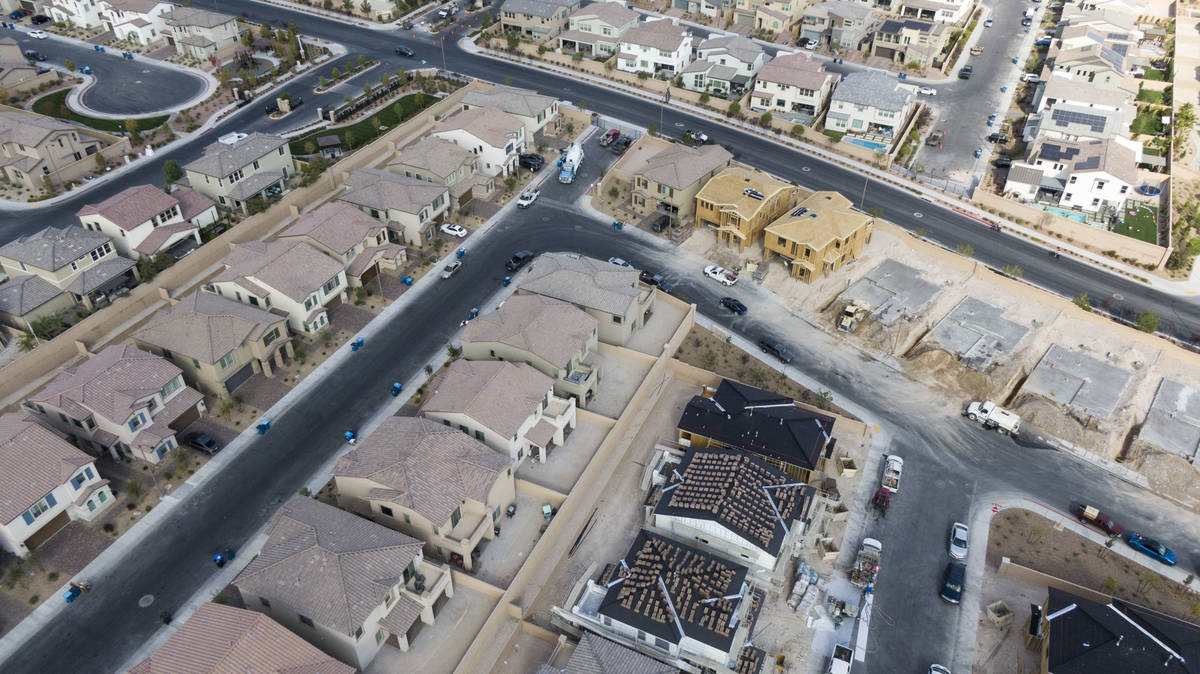 An aerial view of Woodlands at Skye Canyon, a housing development near Skye Village Road and Ea ...