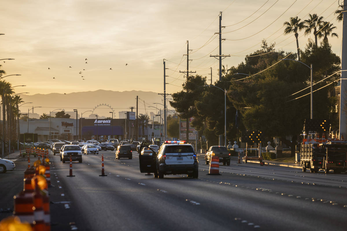 East Sahara Avenue is seen closed near Winterwood Boulevard, for a crash involving a motorcycle ...
