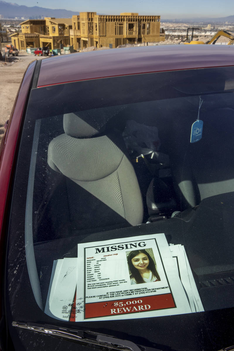 Flyers sit on the dash in Jawaher Hejji's car, which was left at this spot near the Amargosa Tr ...