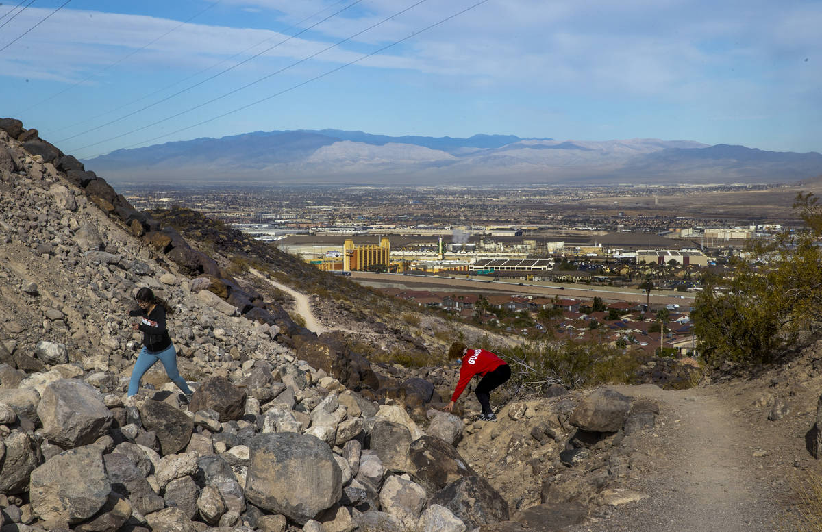 Miriam Hejji, left, and friend Nictoria Pleasant-Rede hike along the Amargosa Trail where her s ...