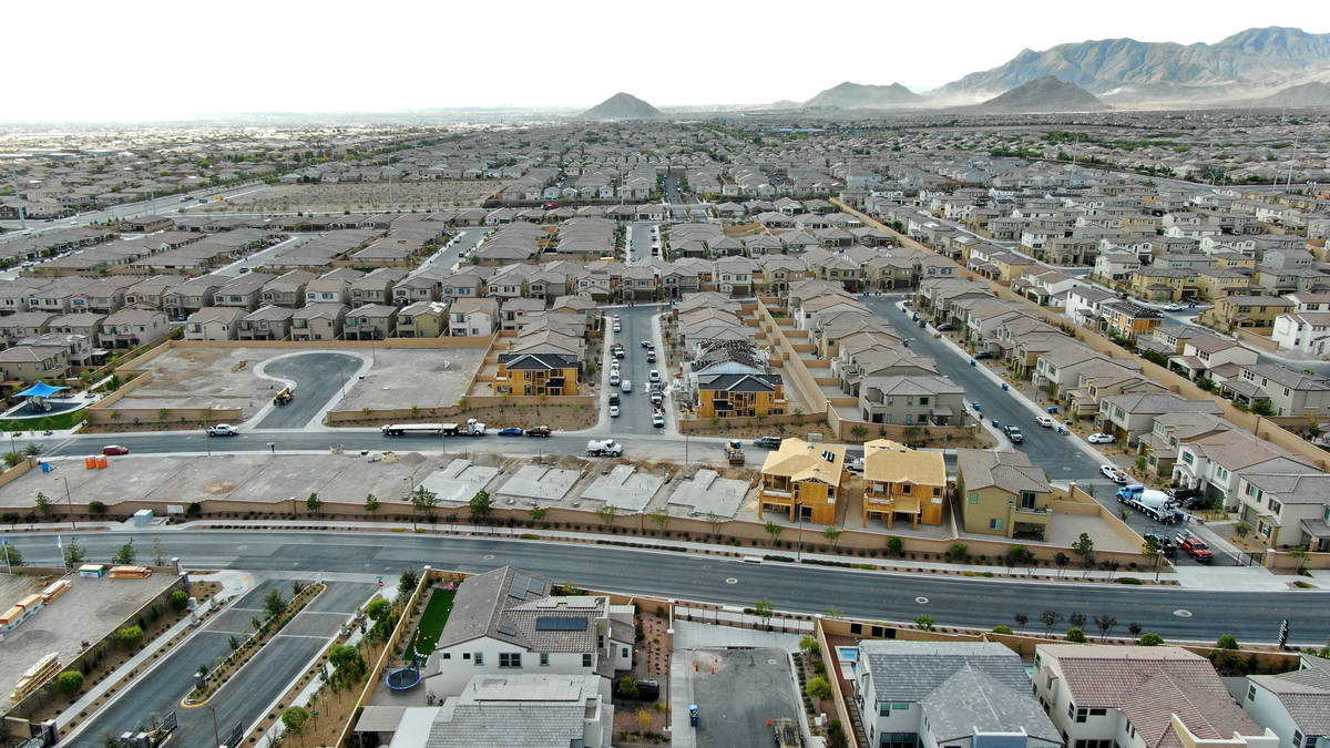 An aerial view of new home construction in Woodlands at Skye Canyon, a housing development near ...