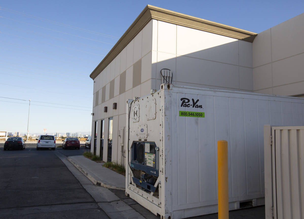 A refrigeration unit that holds bodies sits outside Kraft-Sussman Funeral and Cremation Service ...