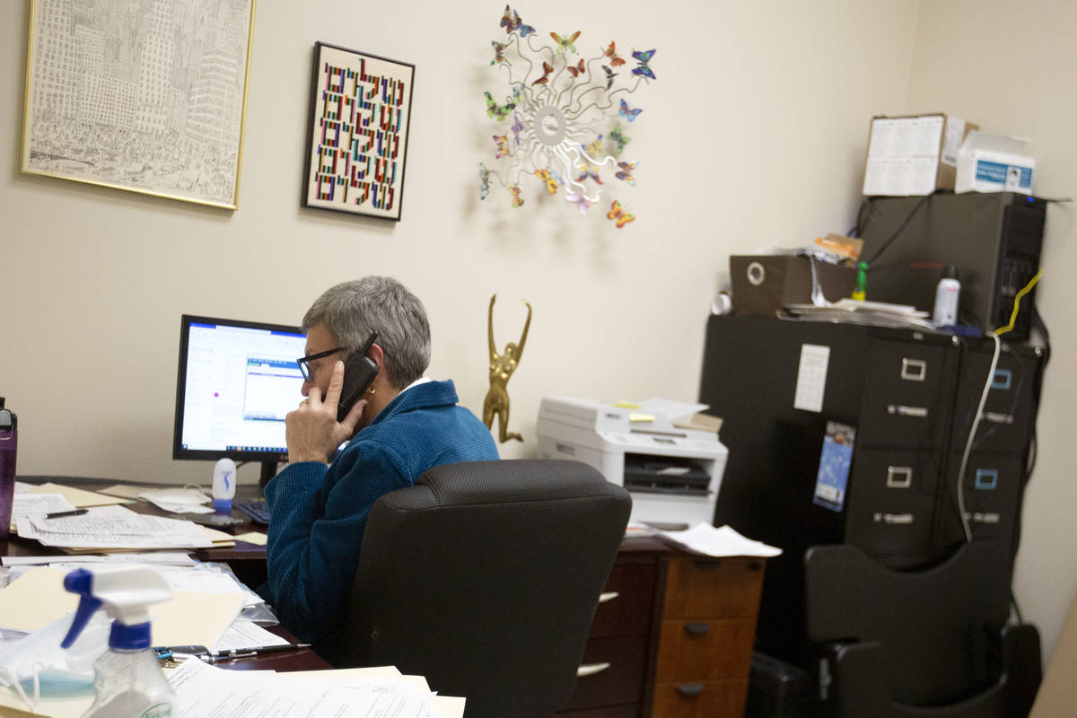 Laura Sussman, funeral director at Kraft-Sussman Funeral and Cremation Services, works in her o ...