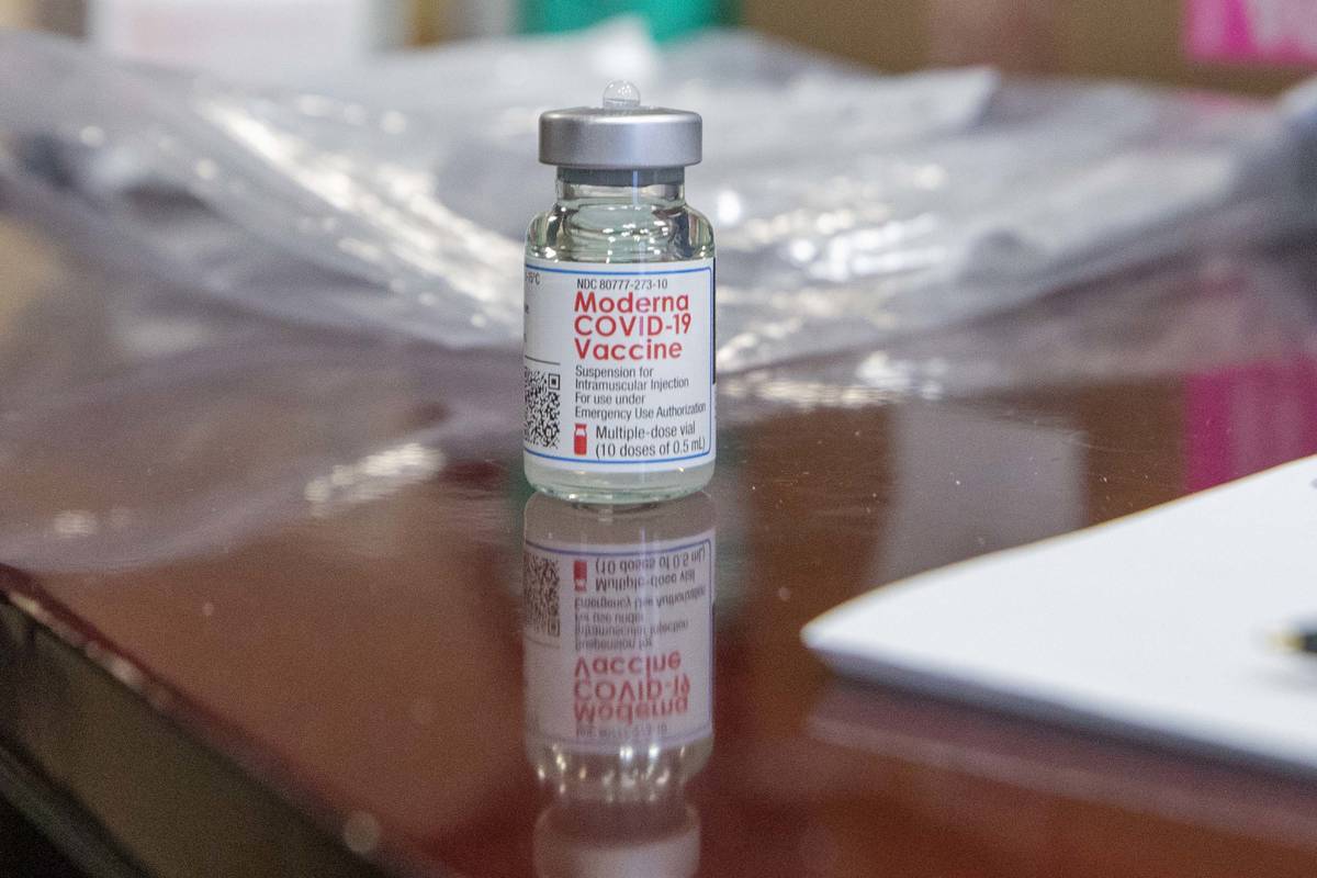 The North Las Vegas Fire Department administrates it’s first batch of a COVID-19 vaccine ...