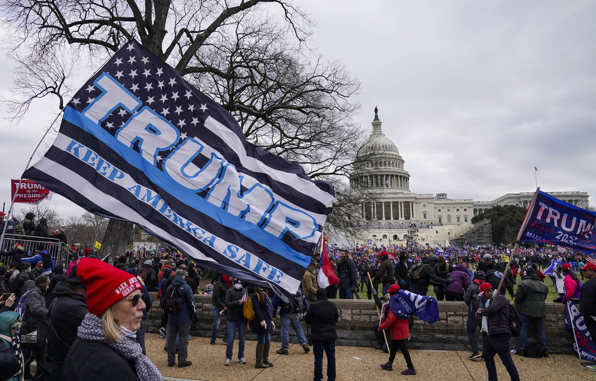 Trump supporters gather outside the Capitol, Wednesday, Jan. 6, 2021, in Washington. As Congres ...