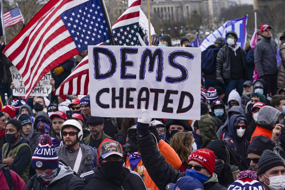 Trump supporters gather outside the Capitol, Wednesday, Jan. 6, 2021, in Washington. As Congres ...