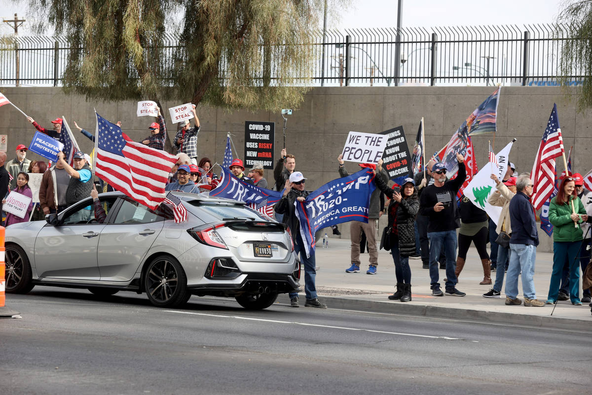 Pro-Trump protesters rally outside the Lloyd George U.S. Courthouse in downtown Las Vegas Wedne ...