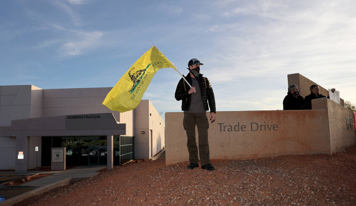 Supporters of President Donald Trump protest at the Clark County Elections Department building ...