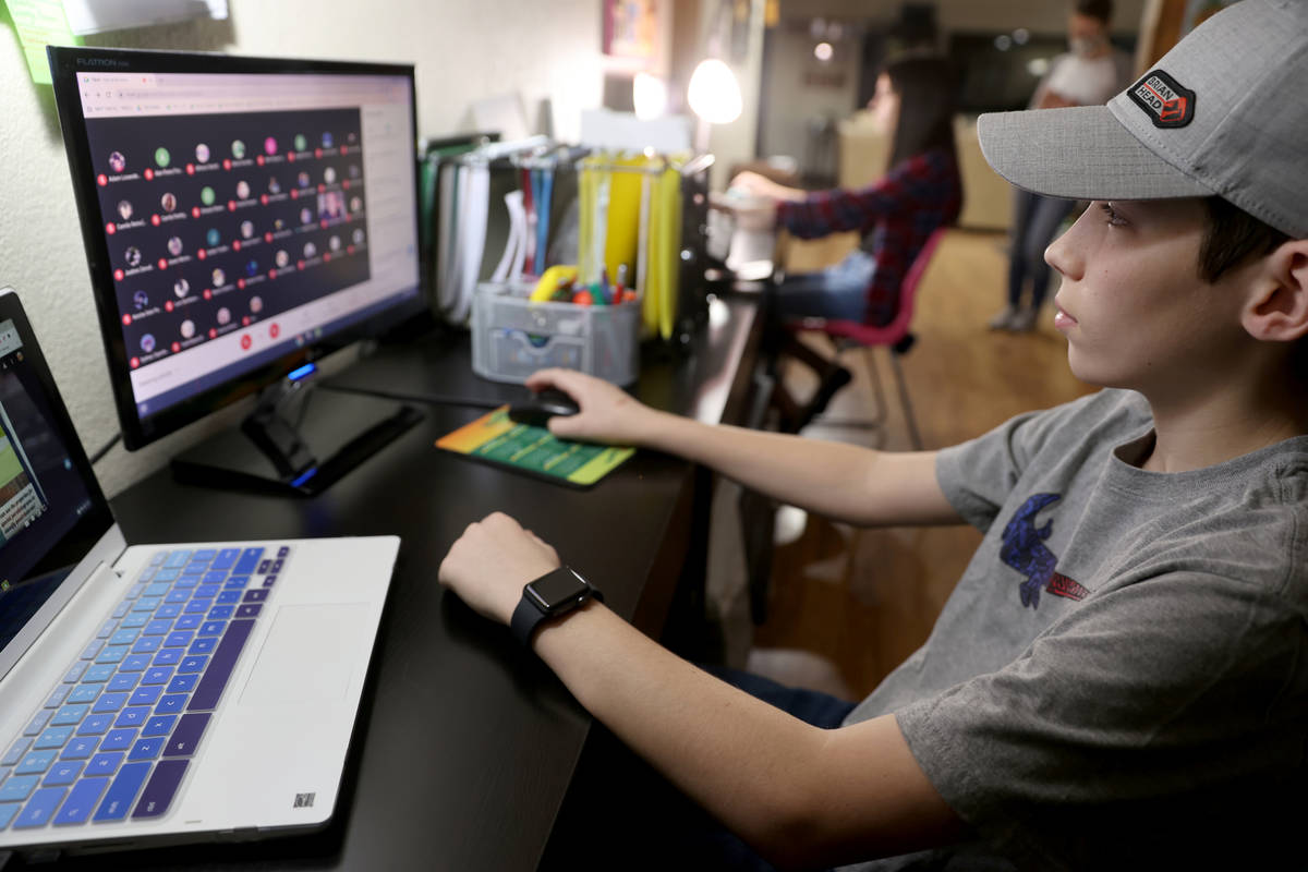 Zacchery and Lynzee Zrebiec, 14, who are freshmen at Southeast Career Technical Academy, during ...