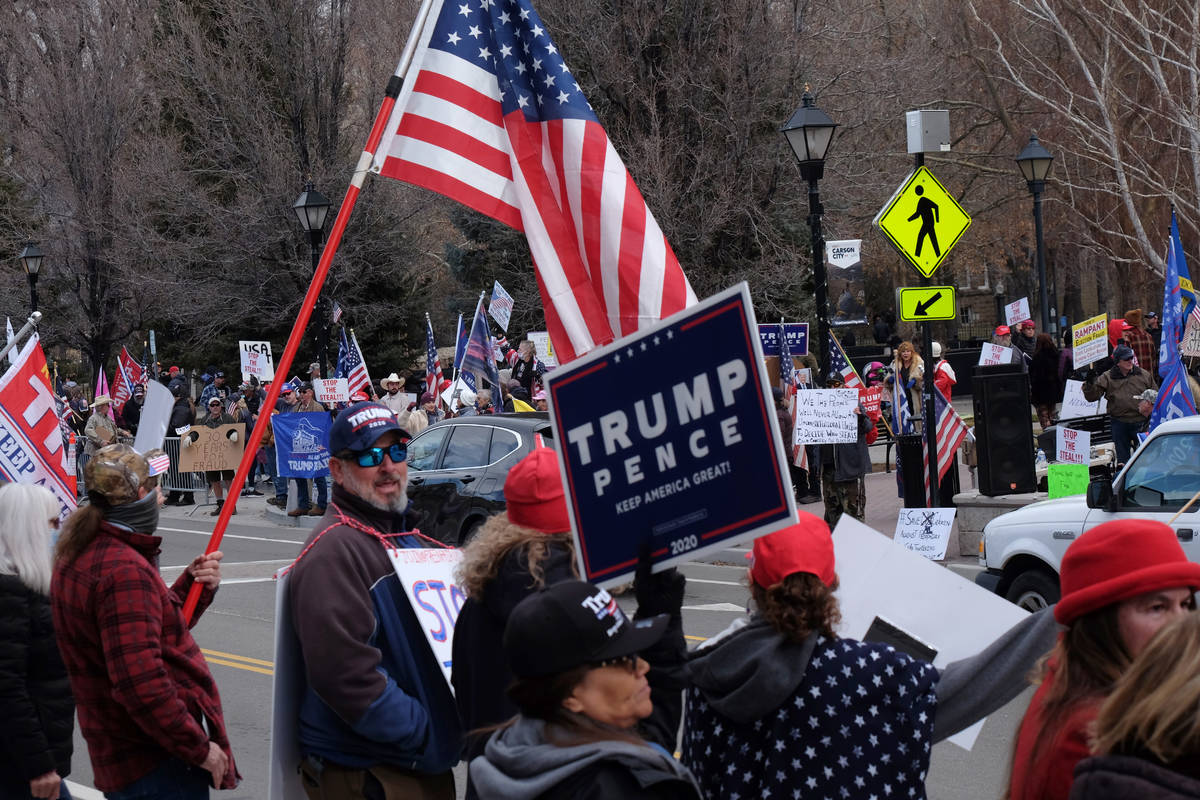 A few hundred Trump supporters gathered Wednesday outside the Legislative Building in Carson Ci ...