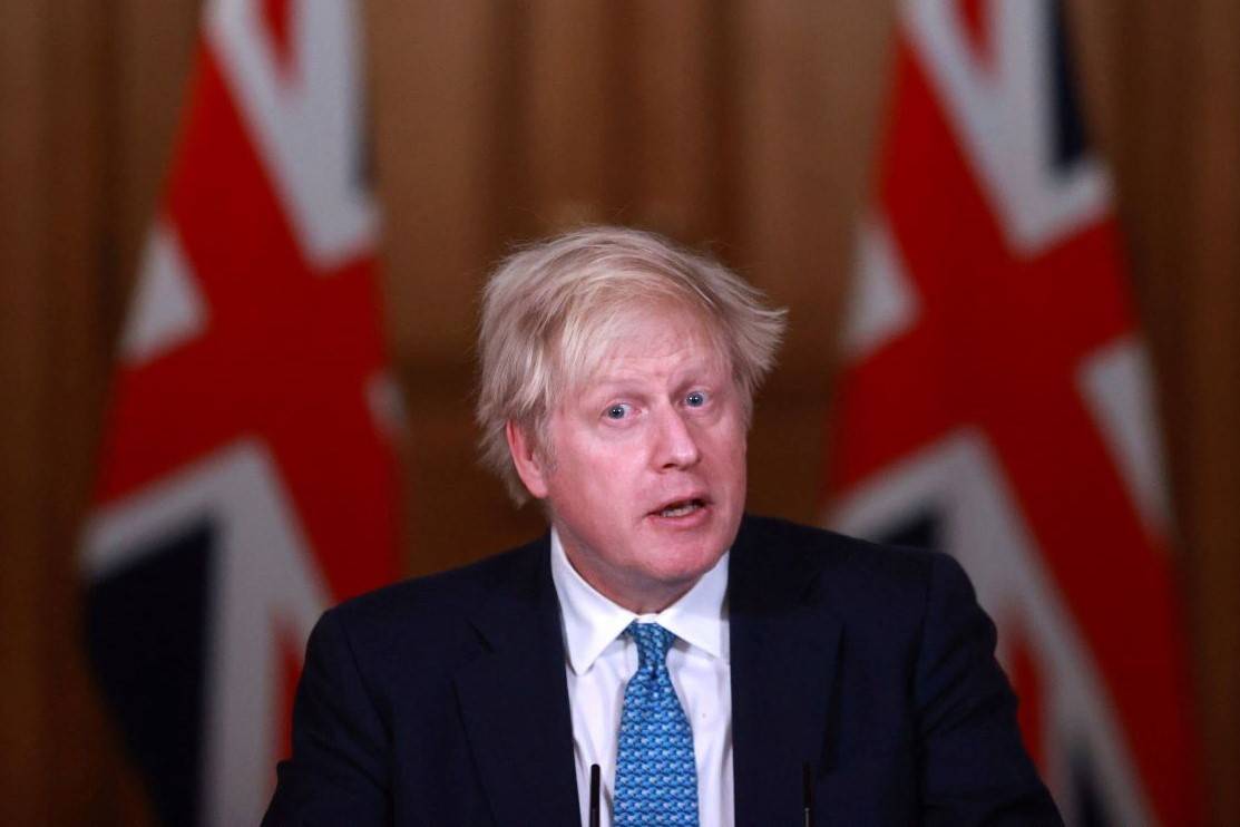 Britain's Prime Minister Boris Johnson speaks during a news conference inside 10 Downing Street ...