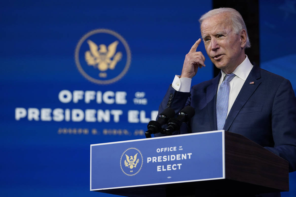 President-elect Joe Biden speaks at The Queen theater in Wilmington, Del., Wednesday, Jan. 6, 2 ...
