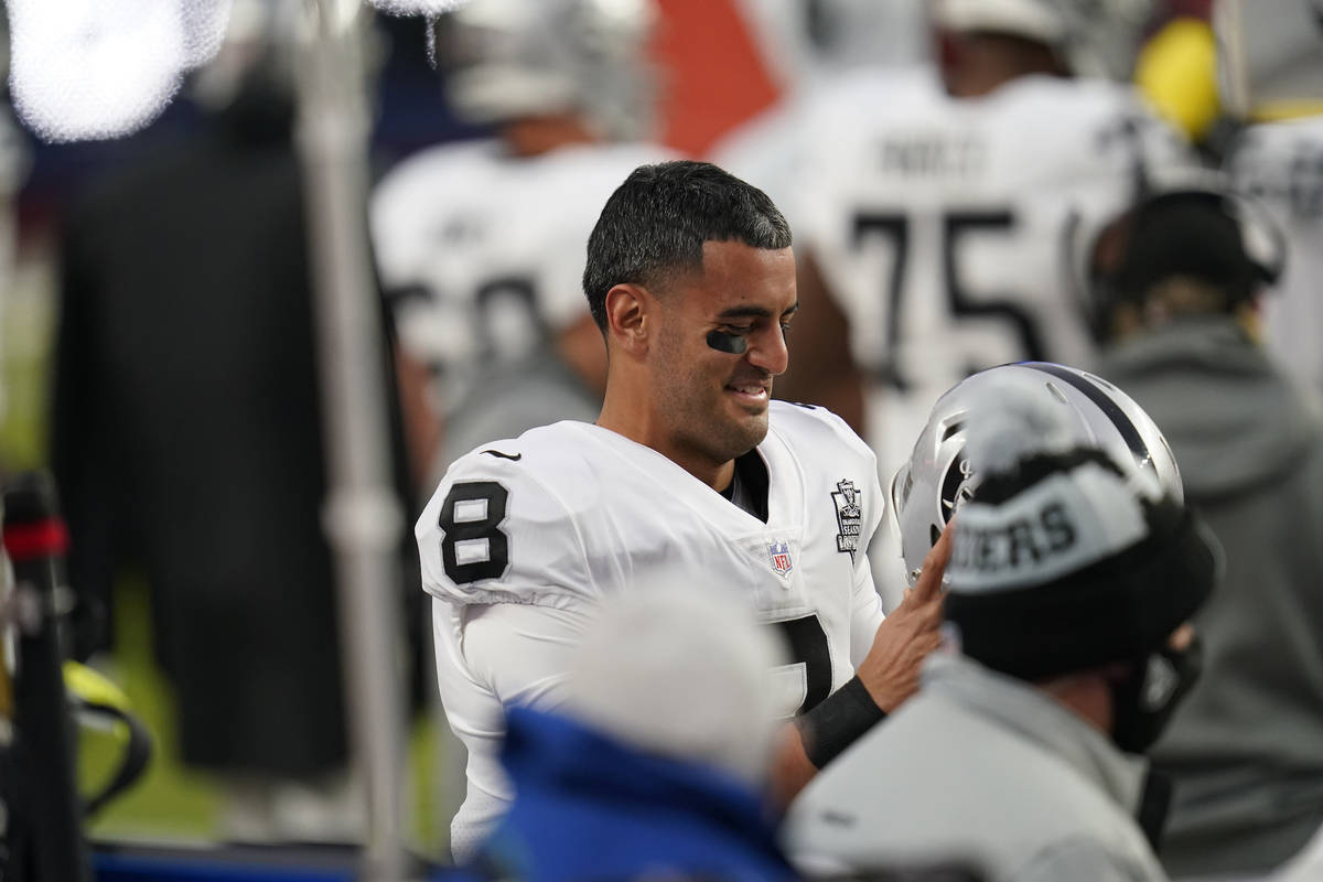 Las Vegas Raiders quarterback Marcus Mariota (8) in the first second half of an NFL football ga ...