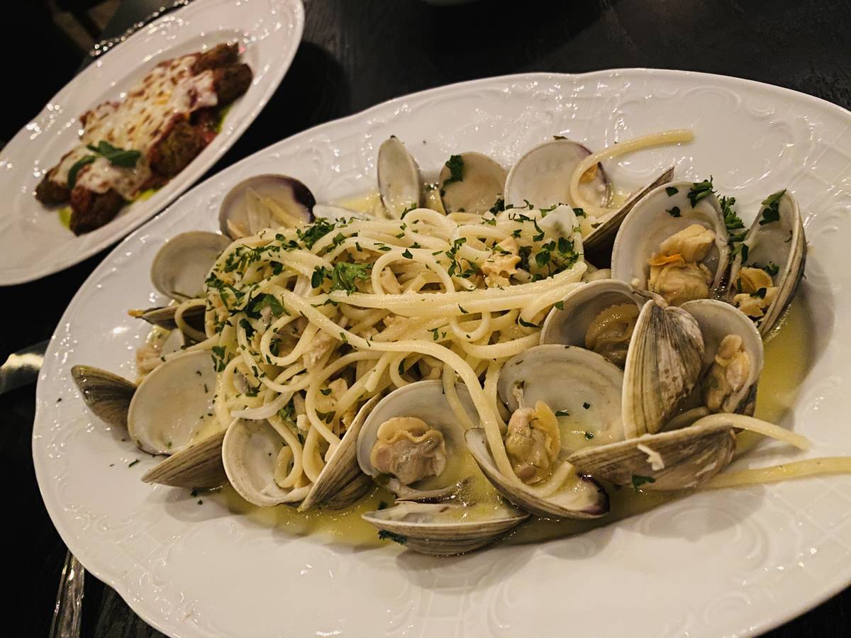 Linguine & clams (front) and eggplant parm at Al Solito Posto (Al Mancini/Las Vegas Review-Journal)