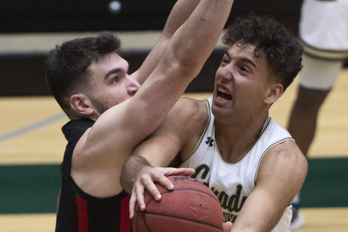 Colorado State guard Isaiah Rivera, right, shoots as UNLV forward Edoardo Del Cadia defends dur ...