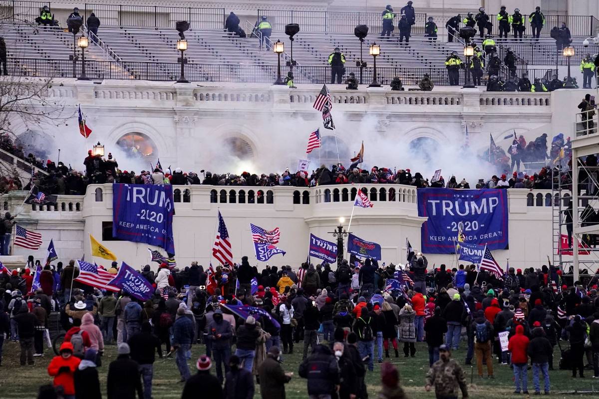 Violent protesters, loyal to President Donald Trump, storm the Capitol, Wednesday, Jan. 6, 2021 ...