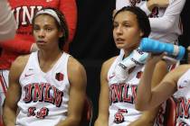 UNLV Lady Rebels guard Bailey Thomas (14), left, and guard Jade Thomas (5), are seen during a t ...