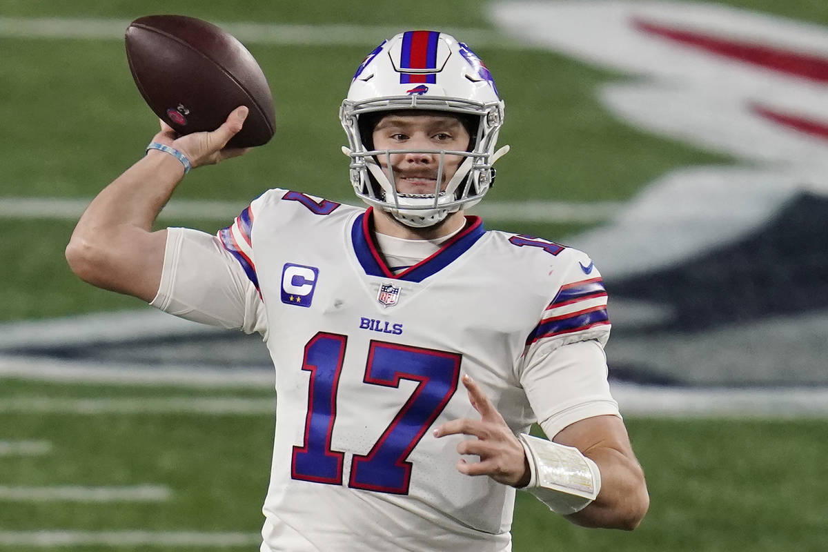 Buffalo Bills quarterback Josh Allen passes the ball in the first half of an NFL football game ...