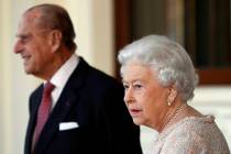 FILE - In this Thursday, Nov. 3, 2016 file photo, Britain's Prince Philip and Queen Elizabeth I ...