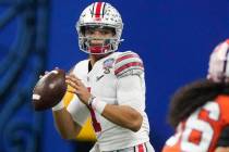 Ohio State quarterback Justin Fields passes against Clemson during the second half of the Sugar ...