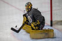 Golden Knights goaltender Marc-Andre Fleury (29) defends his goal during practice on Thursday, ...