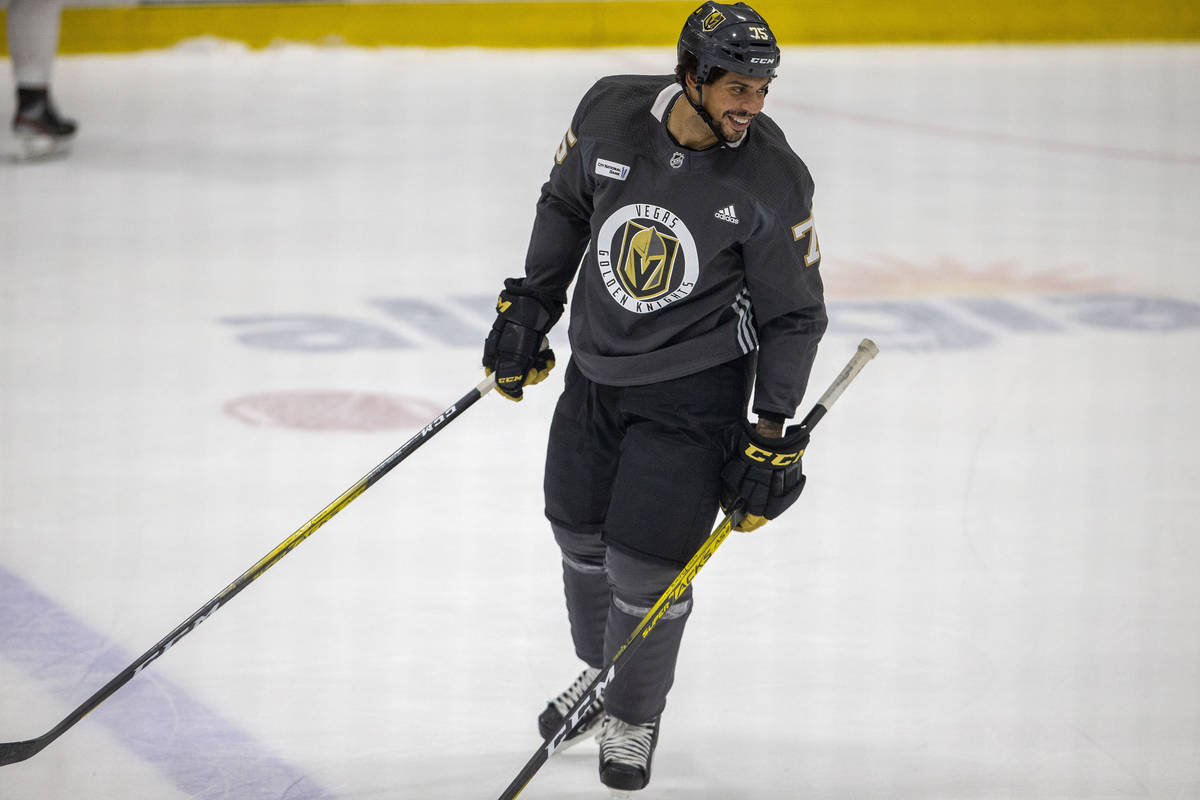Vegas Golden Knights right wing Ryan Reaves (75) gets help with